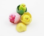 Easter chicks inside egg shells